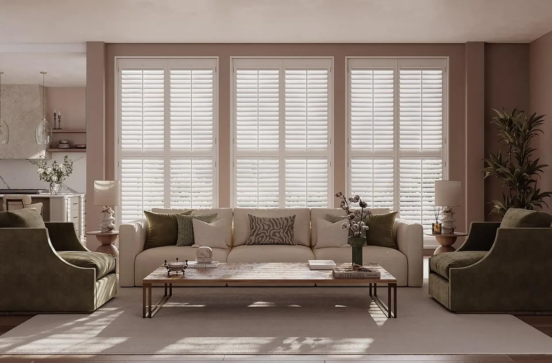 White Luxewood plantation shutters installed on large living room windows behind an elegant sofa.